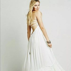 Open back tiered Maxi dress New without tags. Unnoticeable flaw in last pics.